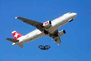 another drone and passenger plane near miss being investigated.