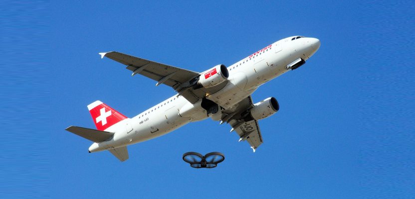 another drone and passenger plane near miss being investigated.